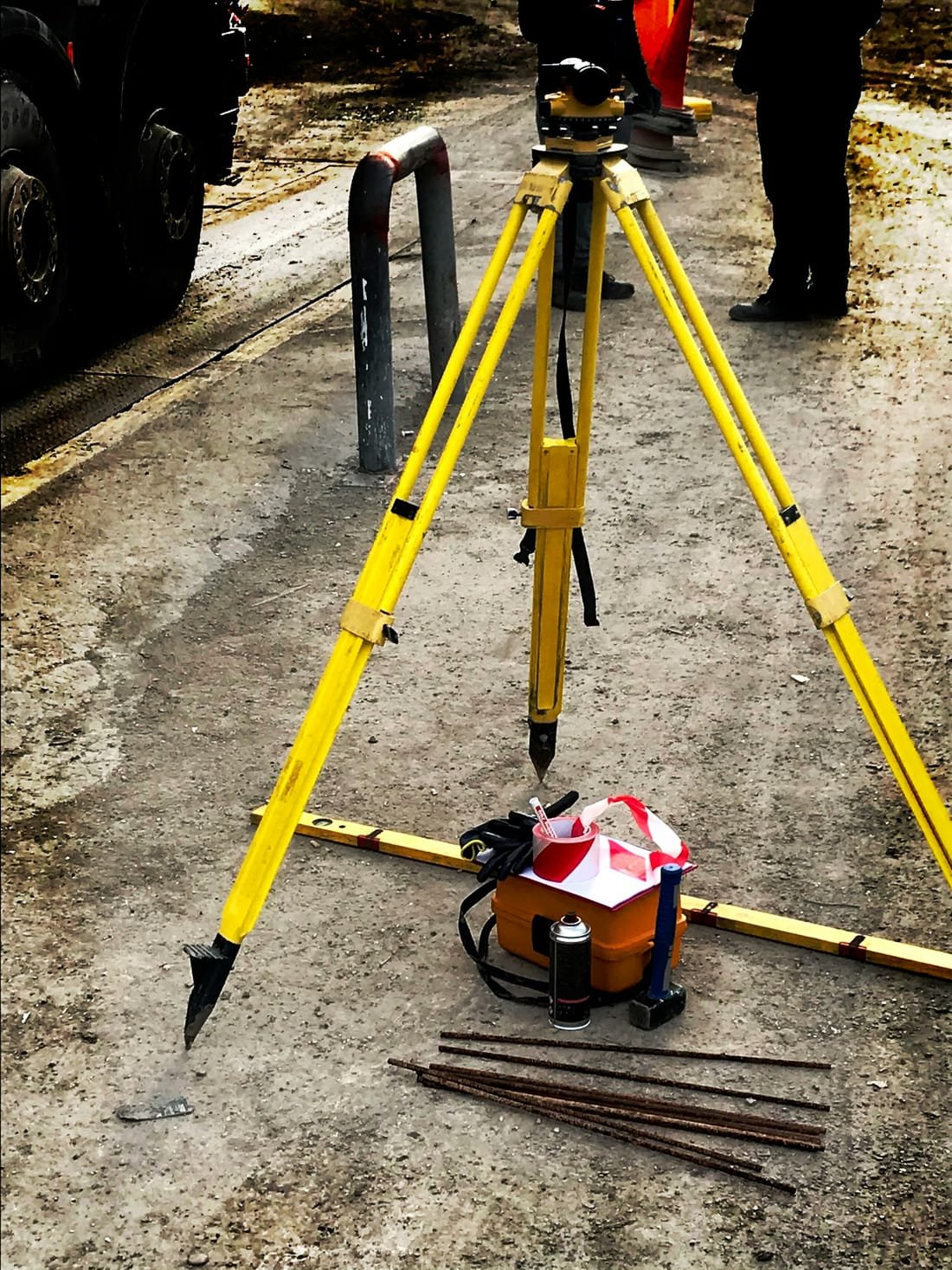 Survey tripod centred over a ground mark